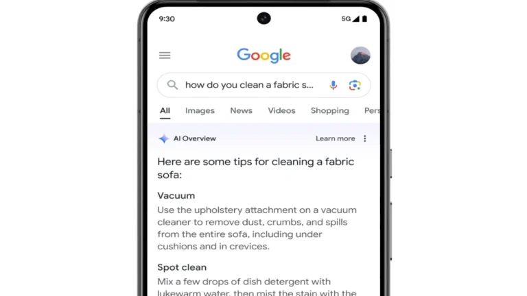 Google Search showing AI Overview with fabric sofa cleaning tips
