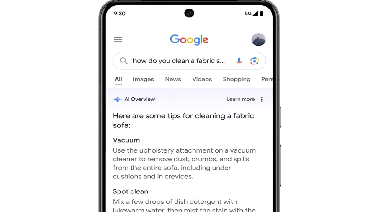 Google Search showing AI Overview with fabric sofa cleaning tips