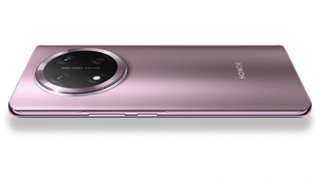 Honor X9C 5G स्मार्टफोन गुलाबी रंग में एक सफेद सतह पर रखा हुआ